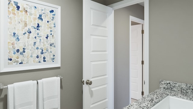 bathroom featuring vanity and radiator heating unit