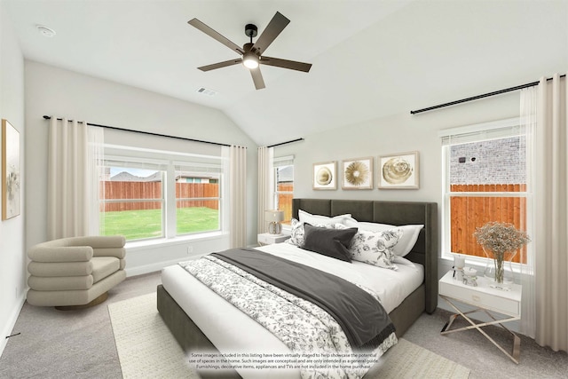 bedroom with ceiling fan, carpet, and vaulted ceiling