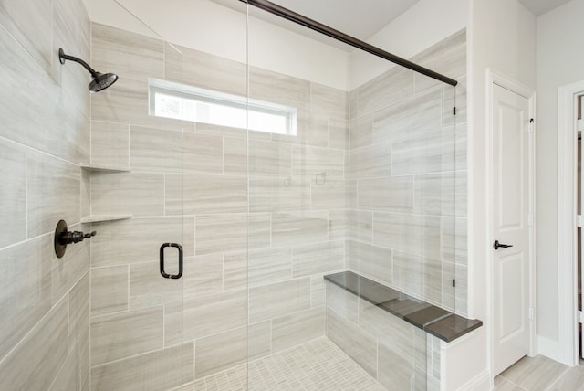 bathroom featuring walk in shower