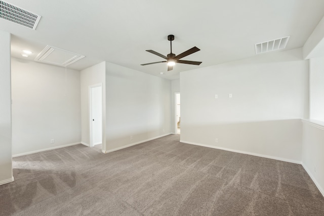 carpeted empty room featuring ceiling fan