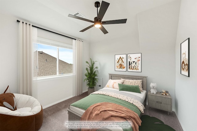 bedroom featuring ceiling fan and carpet