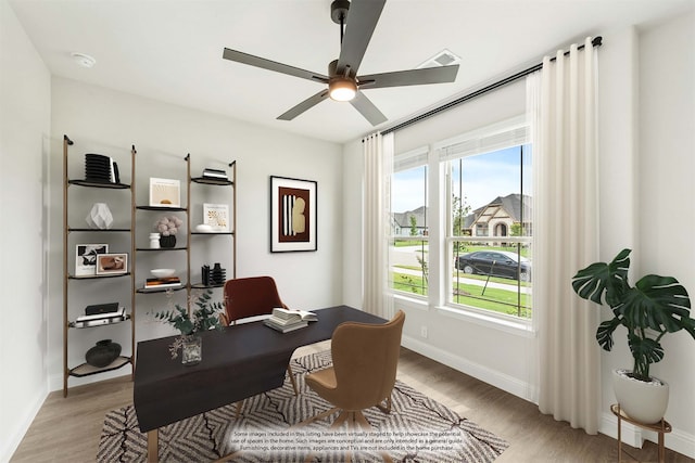 home office featuring ceiling fan and light wood-type flooring