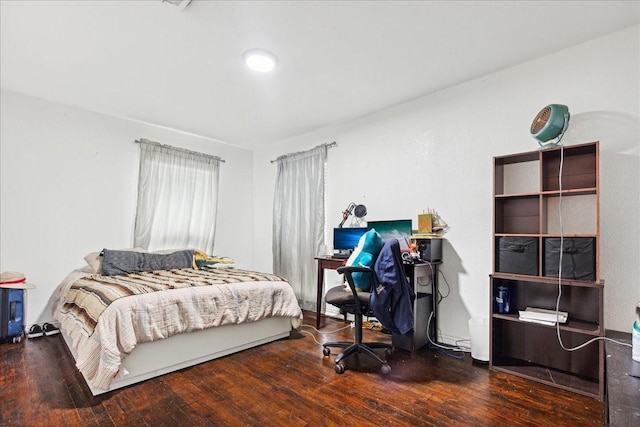 bedroom featuring dark hardwood / wood-style floors