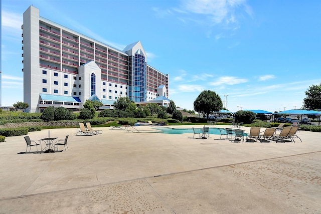 view of pool featuring a patio