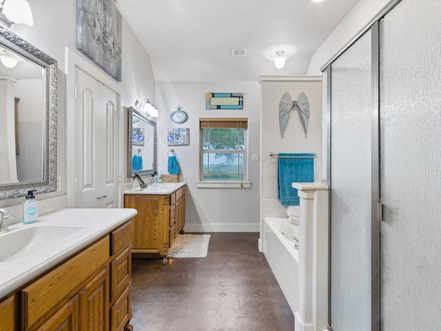 bathroom with vanity, independent shower and bath, and concrete floors