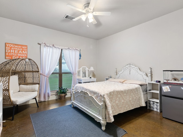 bedroom with ceiling fan and stainless steel fridge