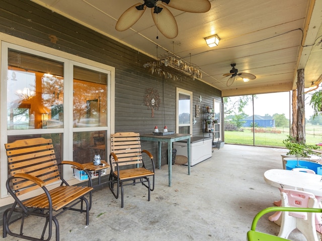 view of patio featuring ceiling fan