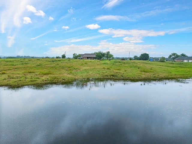 view of water feature with a rural view