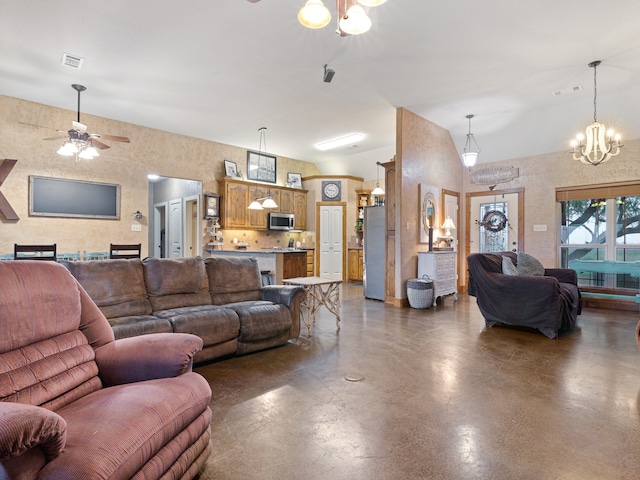 living room featuring a high ceiling and ceiling fan with notable chandelier