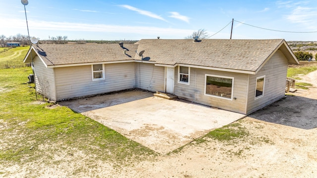 back of property featuring a patio area