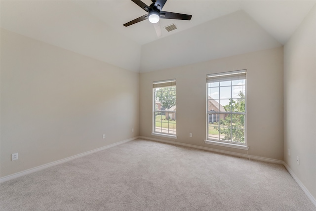 walk in closet featuring light colored carpet