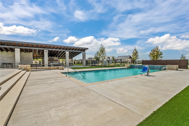 view of pool featuring a patio area