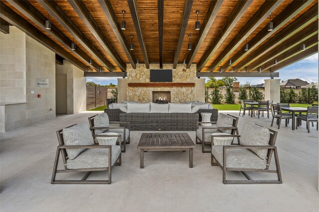 view of patio featuring a community pool and an outdoor living space