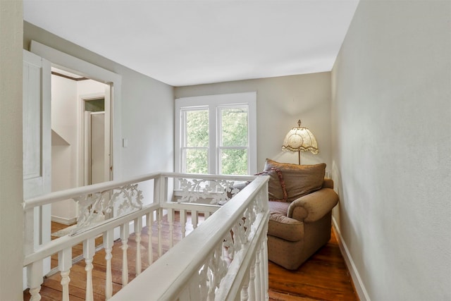 corridor featuring hardwood / wood-style flooring