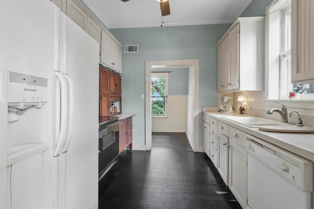 kitchen featuring dark hardwood / wood-style flooring, ceiling fan, ornamental molding, sink, and white appliances