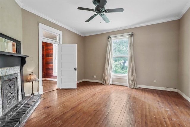 interior space with ceiling fan, hardwood / wood-style flooring, and crown molding