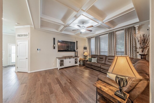 living room with hardwood / wood-style floors, ceiling fan, plenty of natural light, and coffered ceiling