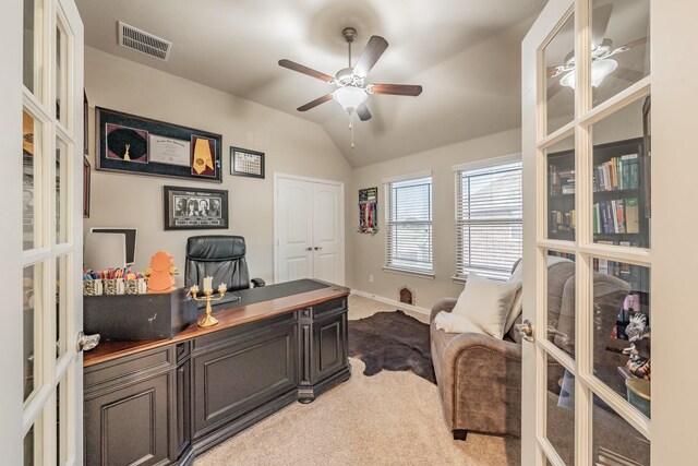 office featuring carpet, ceiling fan, lofted ceiling, and french doors