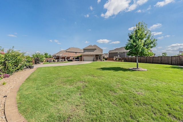 view of yard featuring a garage