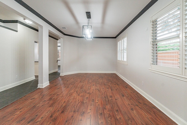 unfurnished dining area with dark hardwood / wood-style flooring and ornamental molding