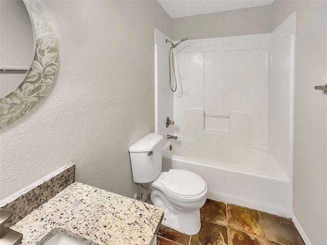 full bathroom with vanity, shower / tub combination, and toilet