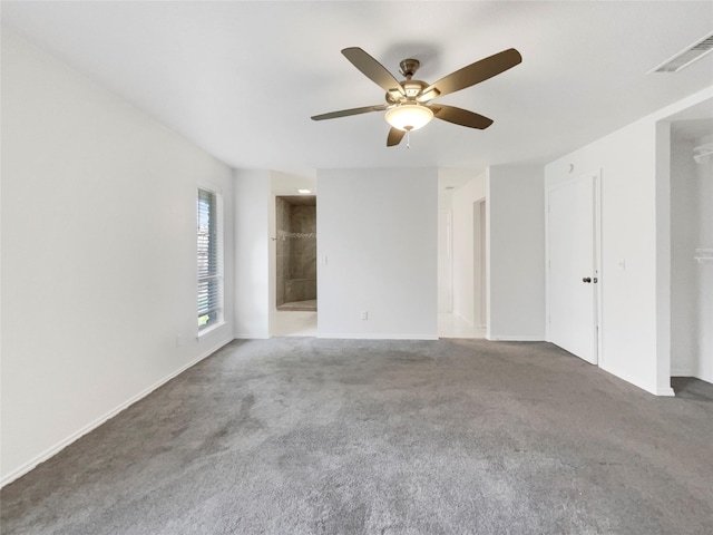 unfurnished room featuring carpet and ceiling fan