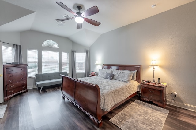 bedroom with ceiling fan, dark hardwood / wood-style flooring, and lofted ceiling