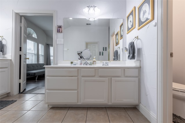 bathroom with vanity and tile patterned floors