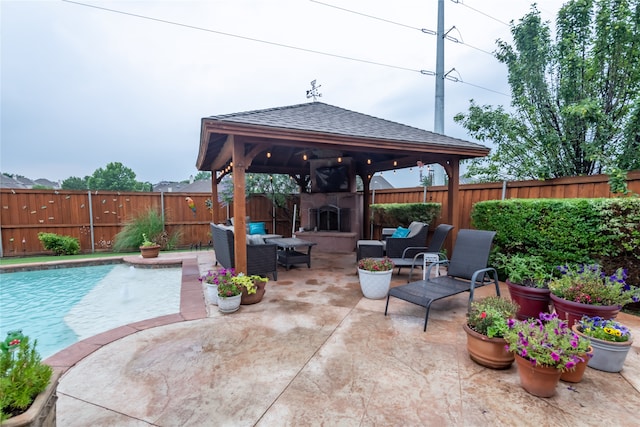 view of patio / terrace featuring a gazebo, a fenced in pool, and outdoor lounge area