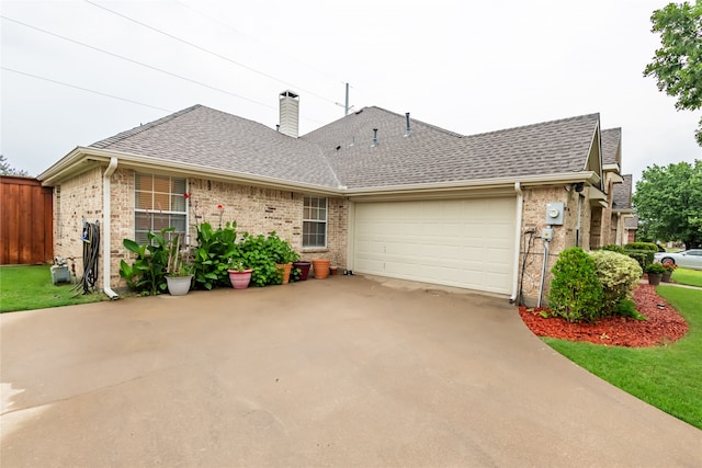 ranch-style home with a garage