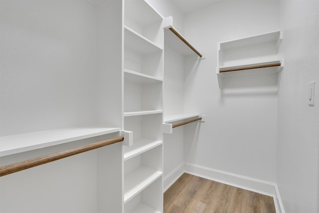 walk in closet featuring light wood-type flooring