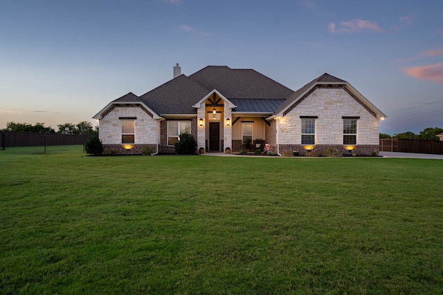 craftsman inspired home featuring a lawn