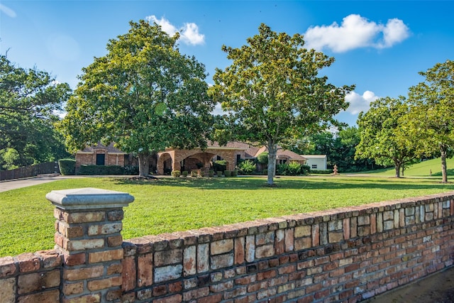 ranch-style house with a front yard