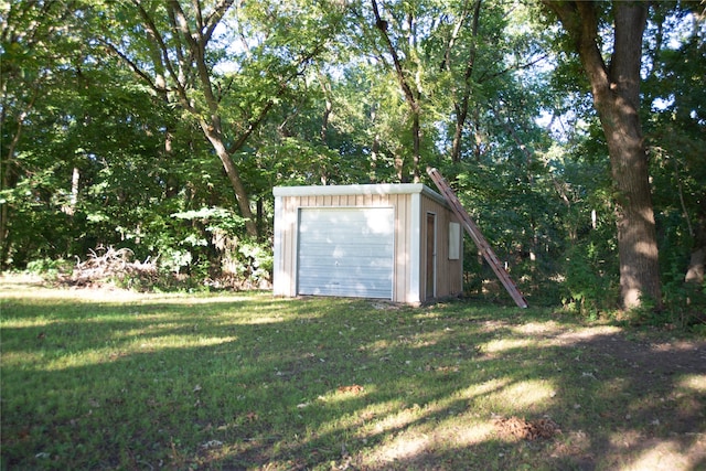 view of outdoor structure with a yard