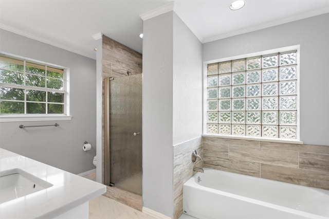 419 State Highway 205th Ext, Rockwall, TX 75032 - bathroom with ornamental molding, a garden tub, a shower stall, double vanity, and plenty of natural light