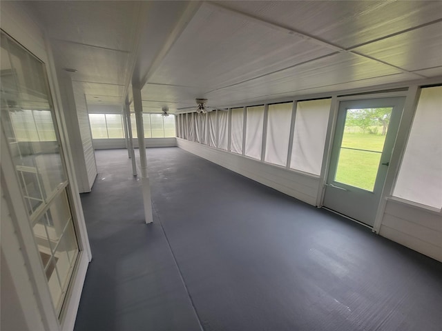 unfurnished sunroom featuring a healthy amount of sunlight