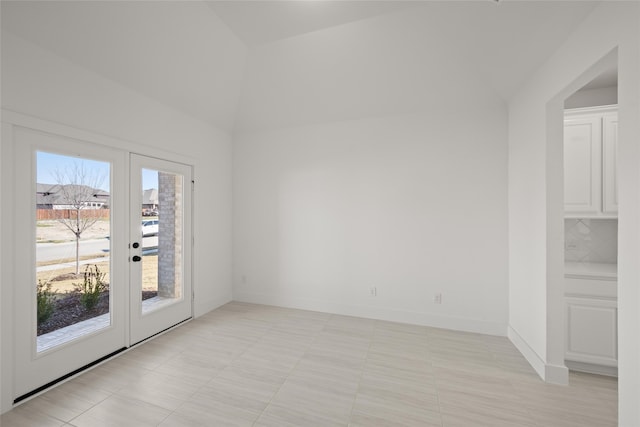 tiled empty room with french doors