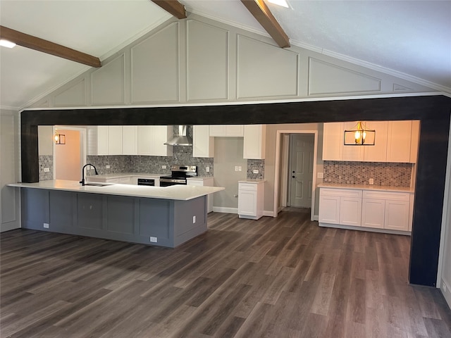 kitchen featuring beam ceiling, electric stove, white cabinetry, and wall chimney exhaust hood