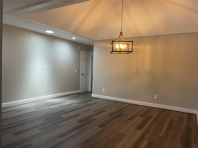 spare room featuring lofted ceiling, a chandelier, and dark hardwood / wood-style floors