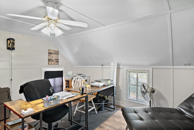 home office featuring hardwood / wood-style flooring, ceiling fan, and lofted ceiling