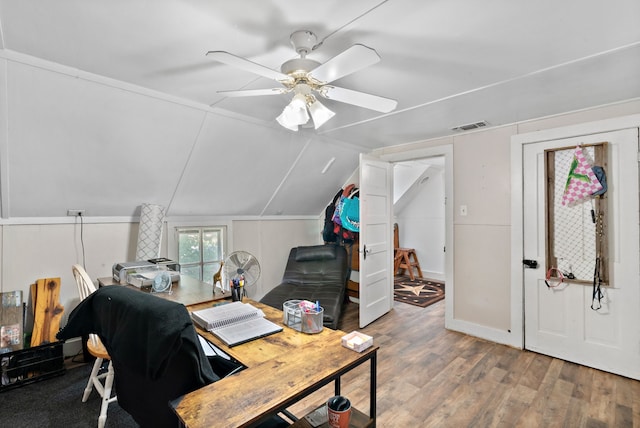 office space with ceiling fan, vaulted ceiling, and hardwood / wood-style flooring