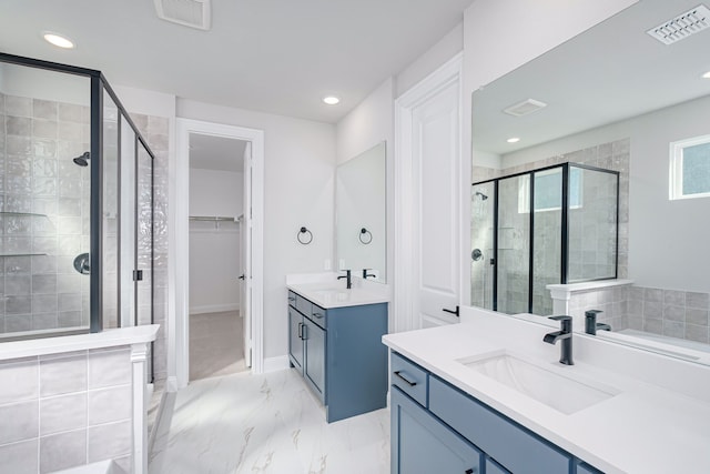 bathroom with vanity and walk in shower