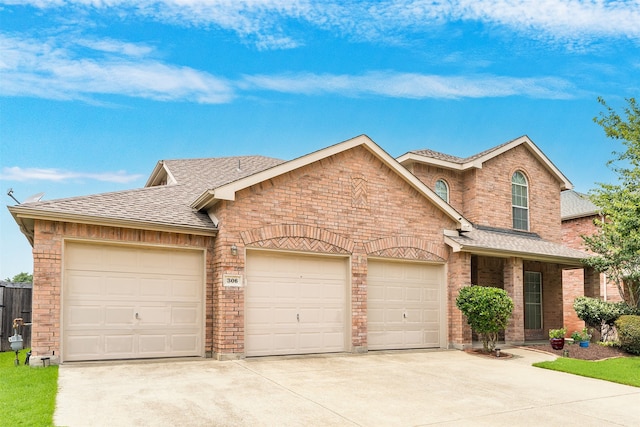 view of front of property featuring a garage