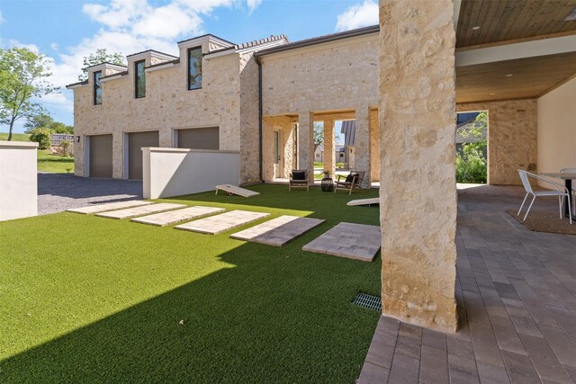 455 Sun Vly, Mabank, TX 75147 - view of grassy yard featuring a garage and driveway