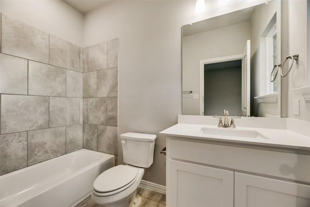 full bathroom featuring vanity, tub / shower combination, and toilet