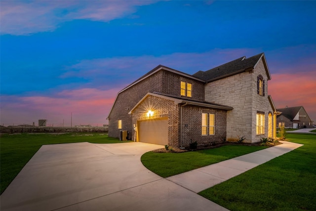 view of front of home featuring a lawn