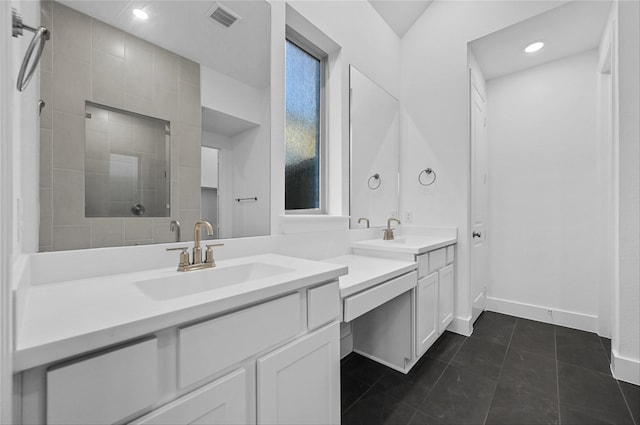 bathroom featuring tile patterned floors, vanity, a shower with door, and vaulted ceiling