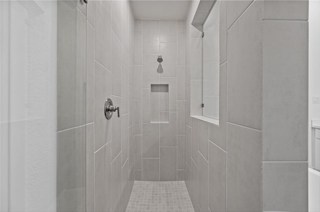 details featuring a tile shower