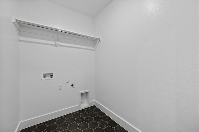 washroom featuring hookup for an electric dryer, tile patterned floors, and hookup for a washing machine