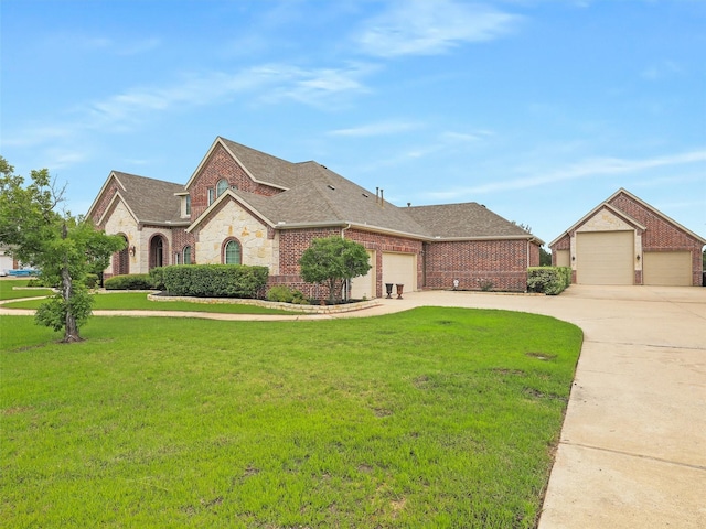 view of front facade with a front lawn and a garage